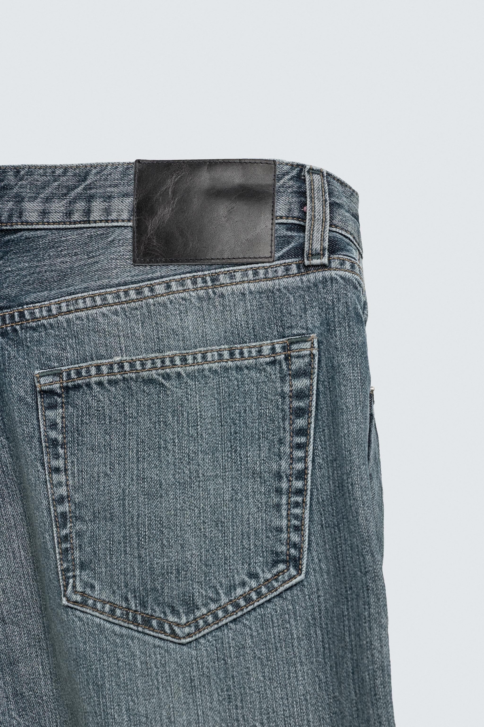 JEAN DROIT BOOTCUT À OUVERTURES